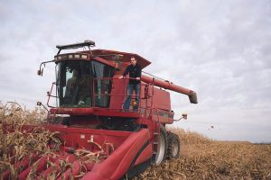 John Schwarz on the home farm combine.